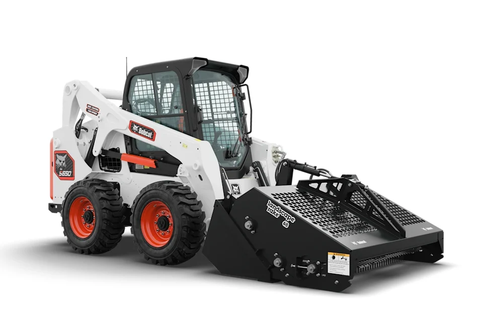 OEM image of Bobcat Classic S650 skid-steer loader with landscape rake